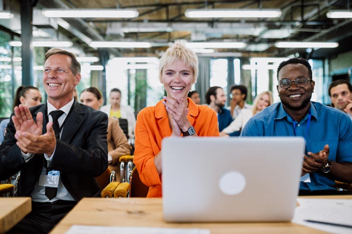 A corporate team happy with the results